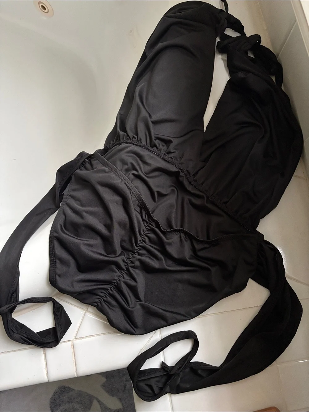 Sleek Black Deep V One-Piece Swimsuit